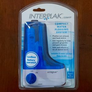 INTERPLAK WATER FLOSSING SYSTEM